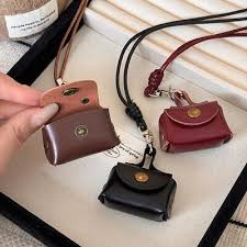 Mini Leather Neck Pouch with Adjustable Strap and Snap Closure